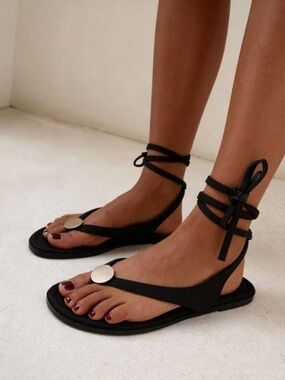 Black Ankle-Tie Flat Sandals with Metallic Accent